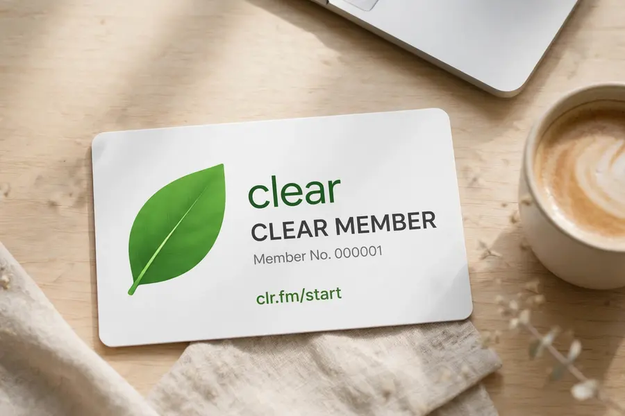 White Clear membership card on a desk